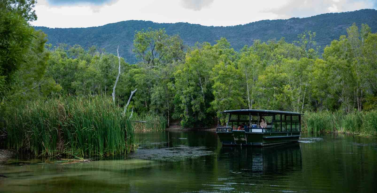 Boat heading down river